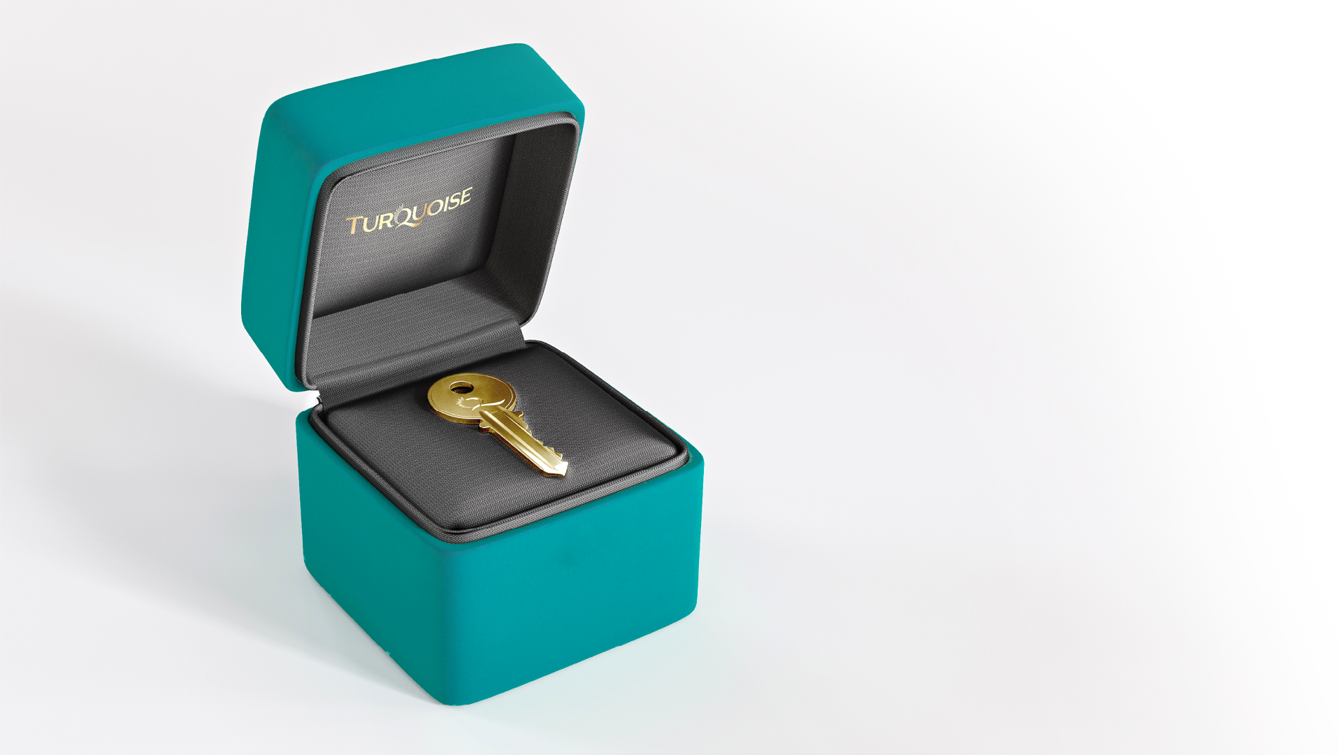 Golden key on a gift box